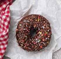 Chocolate donut on top view background photo