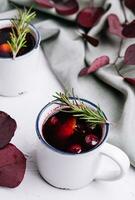 mulled wine in a vintage white mugs photo