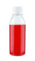 small plastic bottle with strawberry juice on a white photo