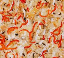 Pizza with chicken and mushrooms with pepper photo