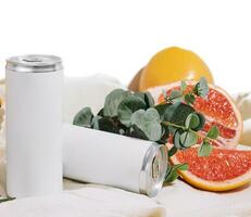 soda in a tin with oranges, grapefruits and pomegranate photo