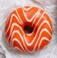 Watercolor orange donut. top view. photo