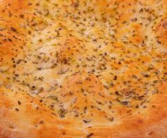 Italian focaccia bread close up background photo