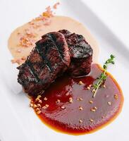 Delicious grilled fillet mignon at the restaurant photo