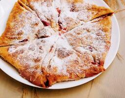 Gozleme or Moldovan pies - Placinta on plate photo