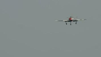 Retro plane flies at airshow. Twoseat sports trainer aircraft, designed for initial training and training of pilots. Soviet plane Yakovlev video