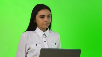 Young businesswoman thinking while working on the computer video