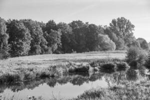 early morning at a  river in germany photo