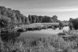 autumn at a  river in germany photo