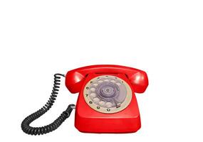 Red vintage desk phone, front view Isolated on a white background photo