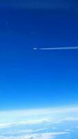 View from an airplane window at high altitude to another airplane. video