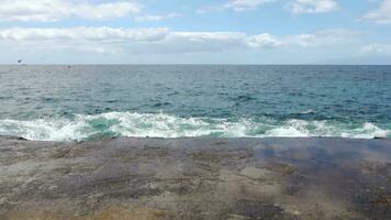 Water surfaces with waves and ripples and the sunlight reflecting at the surface. video
