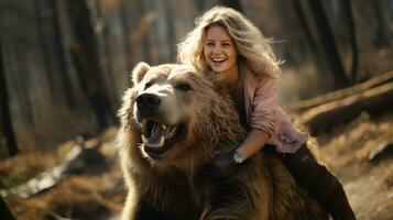 Beautiful young woman and her big brown bear in autumn forest. photo