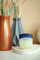 Close up of petroleum jelly in a container photo