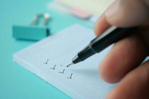 check mark on a check box on a paper photo
