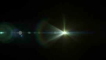 Loop glow multicolored optical flare light on black background video