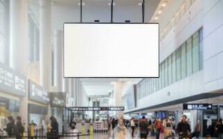 blank billboard. with Blurred image of people walking in airport terminal photo