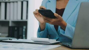 Financial Business team present. Business man hands hold documents with financial statistic stock photo, discussion, and analysis report data the charts and graphs. Finance Financial concept video