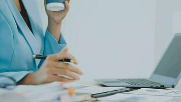 Financial Business team present. Business man hands hold documents with financial statistic stock photo, discussion, and analysis report data the charts and graphs. Finance Financial concept video