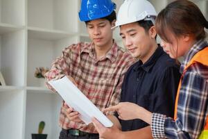 Concept meeting engineers or architects for projects working with partners and engineering tools to create models and blueprints at the job site. construction concept. Engineer concept. photo