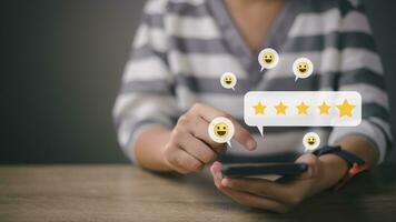 User give rating to service experience on online application, Customer review satisfaction feedback survey concept, Customer can evaluate quality of service leading to reputation ranking of business. photo