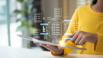 Document Management System DMS, Woman manage folder and document, the system is used to create, store, manage, and track electronic document. photo