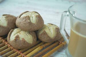 chocolate sweet cookies on wooden table photo