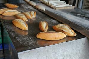 Bread in the oven, detail of old bakery photo