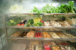 Open Refrigerator Filled With Fresh Fruits And Vegetable. photo