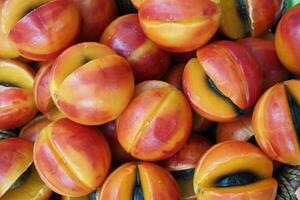 fruit shape colorful natural soap bar in a bowl photo