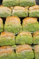 handmade turkish dessert baklava on table photo