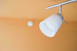 Energy saving. white lighting lamp on the wall photo