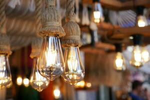 Vintage rope chandelier light on the wall photo