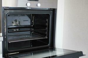 open electric oven at home photo