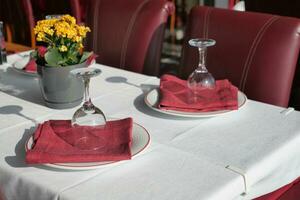 served and decorated round festive table in a restaurant photo