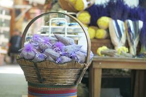 Pouch with lavender in a wooden basket. photo