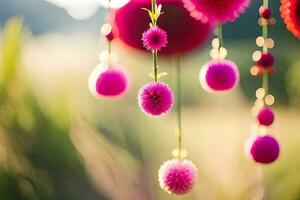 pom poms hanging from a string in the grass. AI-Generated photo