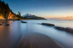 a long exposure photograph of a mountain range and a beach at sunset. AI-Generated photo