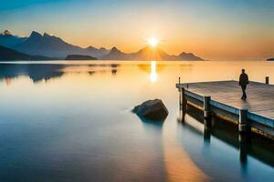 a man standing on a dock looking at the sun setting over mountains. AI-Generated photo
