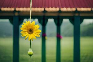 a yellow flower hanging from a gazebo. AI-Generated photo