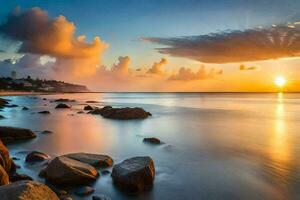 un hermosa puesta de sol terminado el Oceano con rocas y agua. generado por ai foto