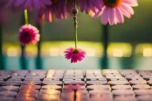 pink flowers hanging from a string over a pool. AI-Generated photo