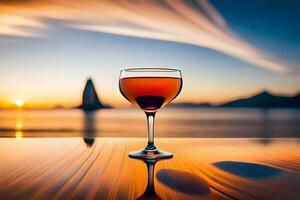 a glass of wine on a table in front of the ocean. AI-Generated photo