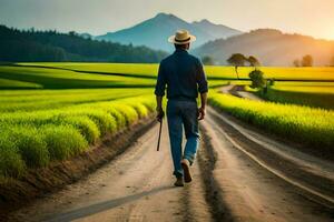 un hombre caminando abajo un suciedad la carretera en un arroz campo. generado por ai foto