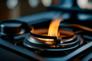 a close up of a gas stove with a flame. AI-Generated photo