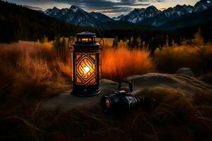 a lantern and camera on a mountain at sunset. AI-Generated photo