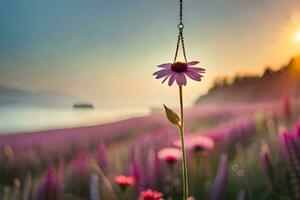 a flower is hanging from a chain in front of a beach. AI-Generated photo