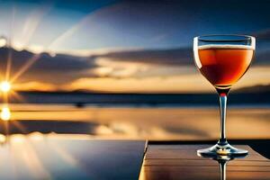 un vaso de vino en un mesa en frente de el puesta de sol. generado por ai foto