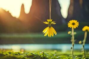 yellow flowers hanging from a rope in front of a lake. AI-Generated photo