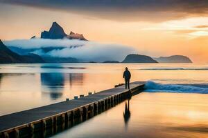 a man standing on a pier looking out at the ocean and mountains. AI-Generated photo